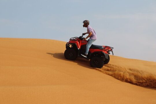 Dubai Desert Quad Bike Ride Adventure And BBQ Dinner Camp