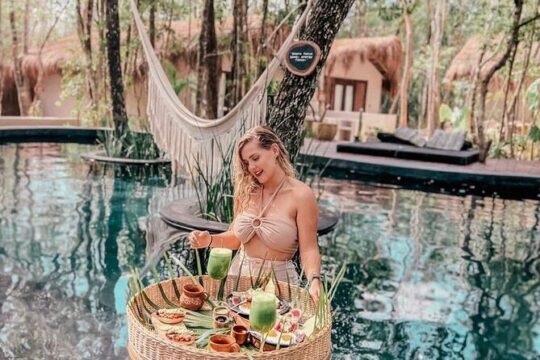 Floating breakfast in The Yellow Nest (near Dos Ojos cenote)
