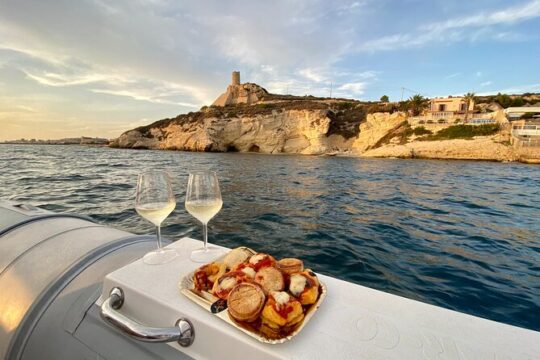 Aperitif at sunset by boat in Cagliari