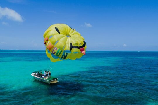 Parasail with transportation over Cancun bay