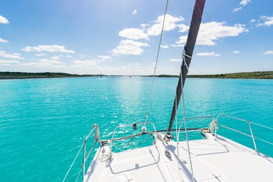 NEW! Catamaran Cruise with Open Bar through the 7 Colors Lagoon