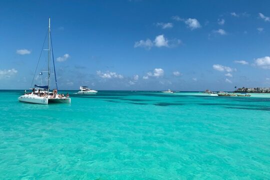 Catamaran Party on the Caribbean Sea to Isla Mujeres - Open bar Included