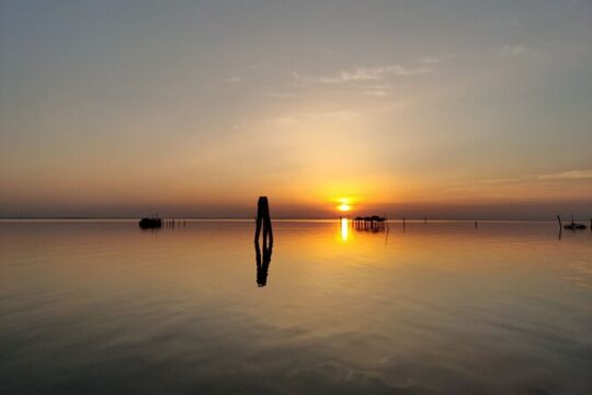 Golden Hour In The Venetian Lagoon By Boat