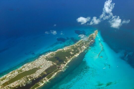 Luxury Sailing Experience to Isla Mujeres with Lunch & Open Bar