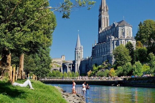Experience Lourdes: Guided Tour & Convenient Transport