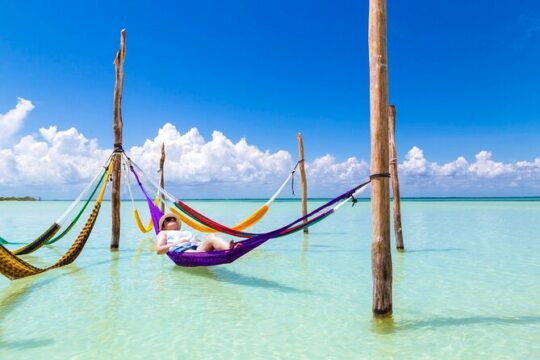 Full-Day Boat Tour in Holbox, Passion Island and Cenote Yalahau