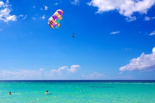 Negril beach day out with Parasailing and Rick's cafe activity