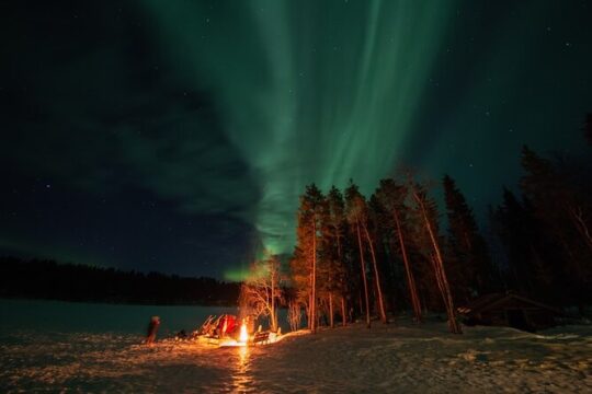 Northern Lights Hunting in Lappish old cottage