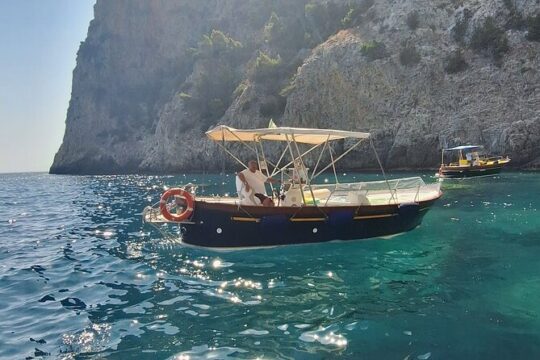 Private Tour Around The Island Caves and Seabeds of the Blue Sea