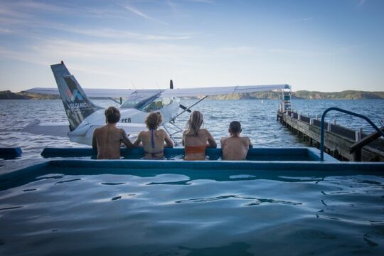 Crater Lakes Scenic Flight with Natural Hot Pool Bathing by Floatplane