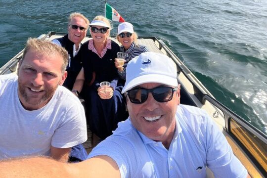 Boat excursion covered in wood Lake Como