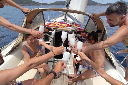 Sunset aperitif on a sailing boat in Alghero