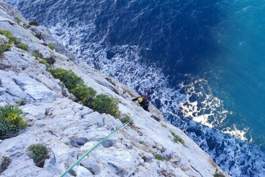 From Nebida: climbing the cliff of Masua