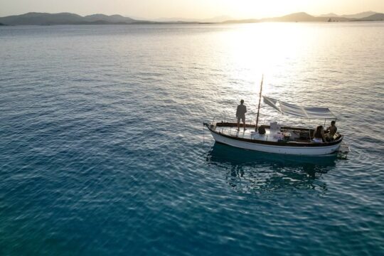 Boat Sunset Aperitif Tour in Tavolara and Molara
