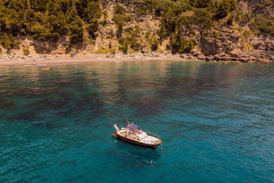 Sunset with aperitif boat in Sorrento